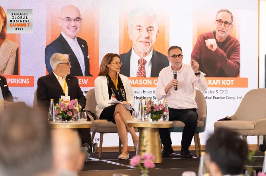 A person sitting in chairs with a microphone in front of a person
AI-generated content may be incorrect.